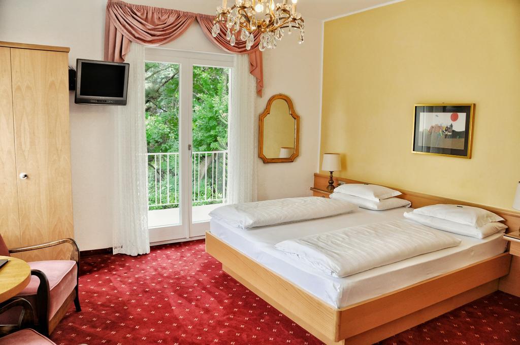Hotel Zima Merano Quarto foto